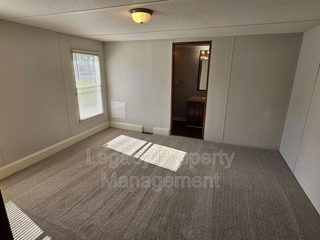 Building Photo - 5405 Swepsonville-Saxapahaw Rd
