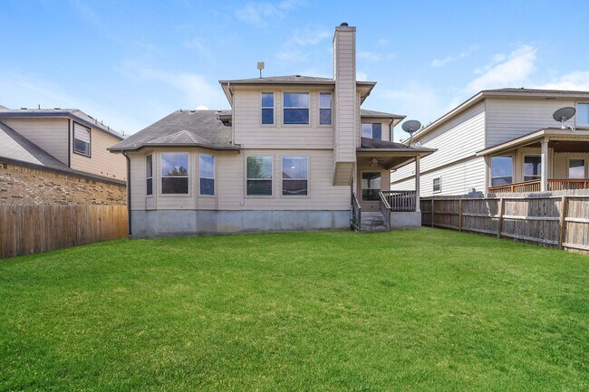 Building Photo - Spacious & Sun-Filled 4BR Retreat with Open-Concept Living and Versatile Dual Living Areas