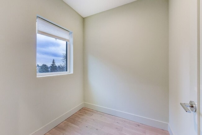 Building Photo - Smart Layout, Prime Location, and a Rooftop That Seals the Deal