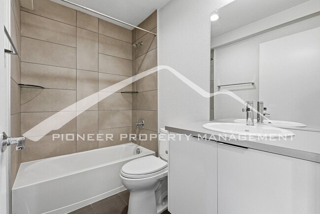 Building Photo - Spacious Townhouse with Central AC and 2-Car Garage