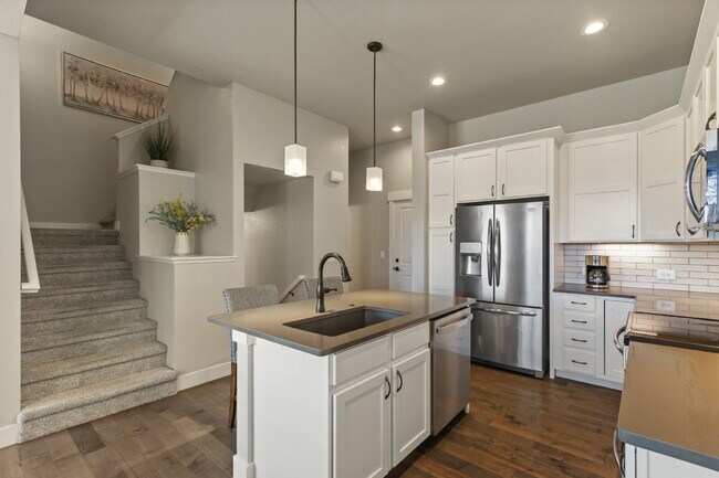 Building Photo - Stunning 3 bed, 4 bath townhome - attached...