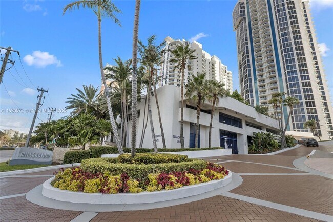 Building Photo - 18671 Collins Ave