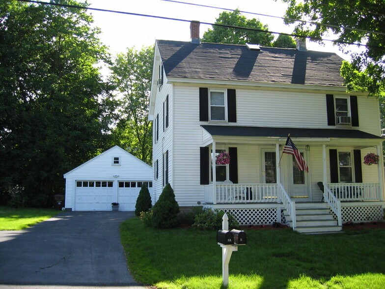 Duplex. Unit on the right is available. Comes with one garage parking space. - 11 Adams Street