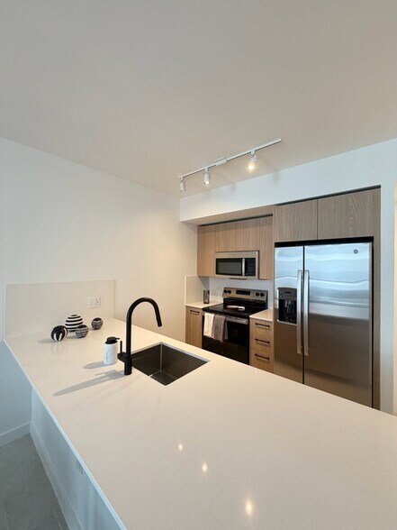 Building Photo - 1690 NW 28th Ave