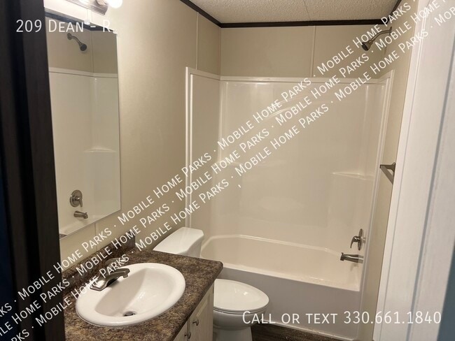 Building Photo - 209 Dean-R