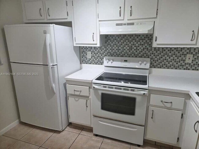 Building Photo - 7406 Woodmont Terrace