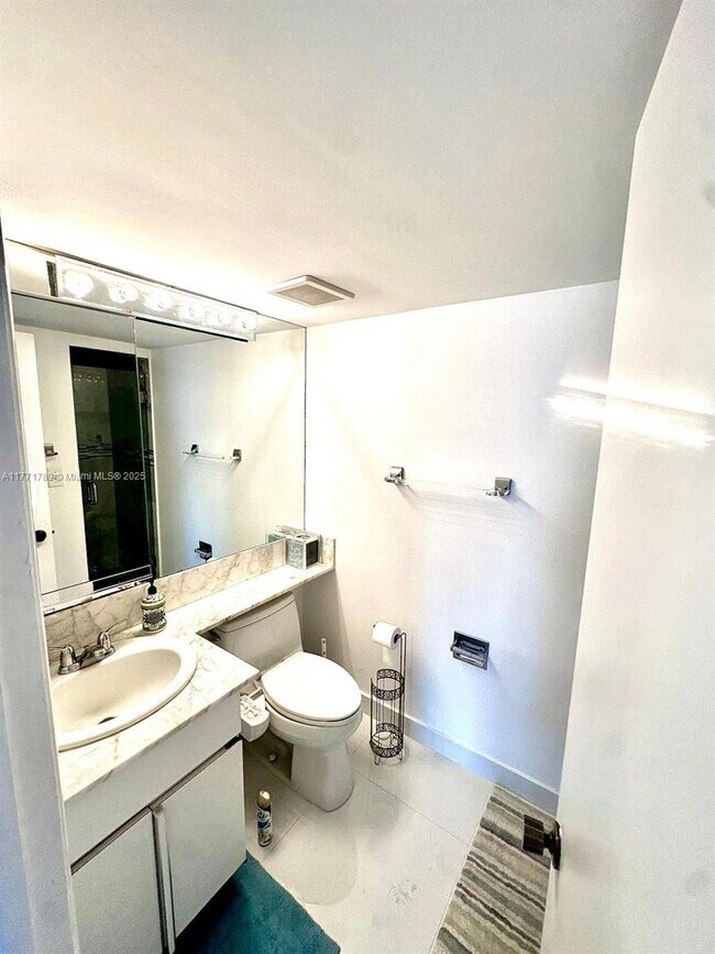 Building Photo - 6423 Collins Ave