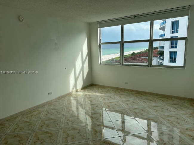Building Photo - 6039 Collins Ave