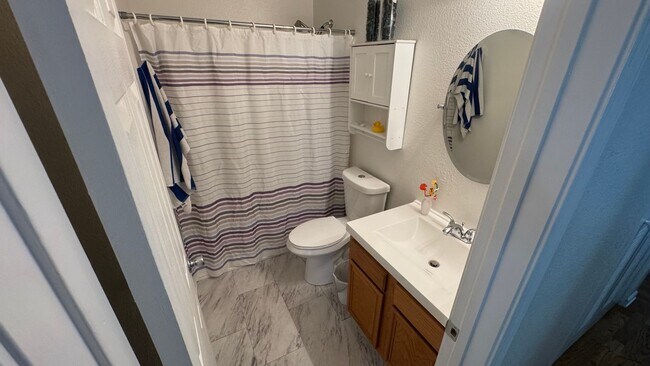 Building Photo - 4bed/2bath/2car garage. RV parking & massive landscaped backyard in cut-de-sac
