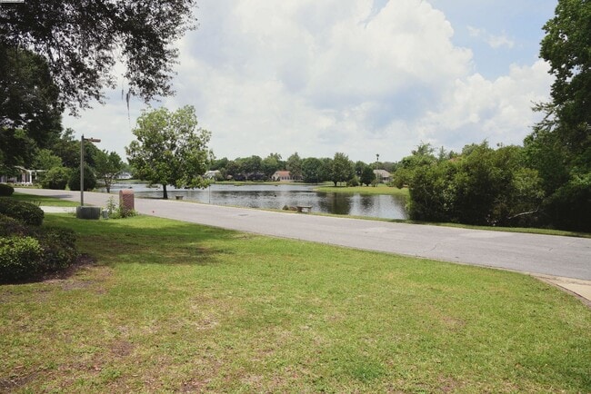 Building Photo - Executive Lakeview Home in Gated Windward Community!