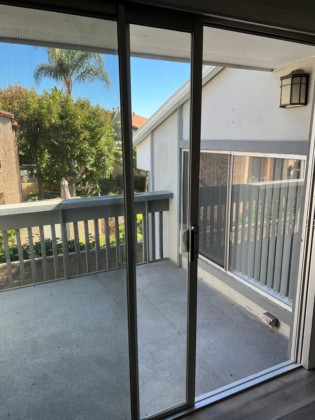 Building Photo - Upstairs Studio Condo in Huntington Harbor...