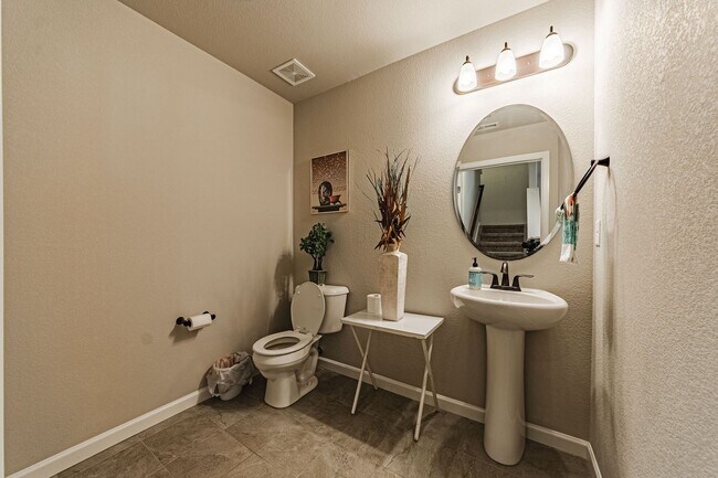 Building Photo - Cozy Fully Furnished  COS Townhome