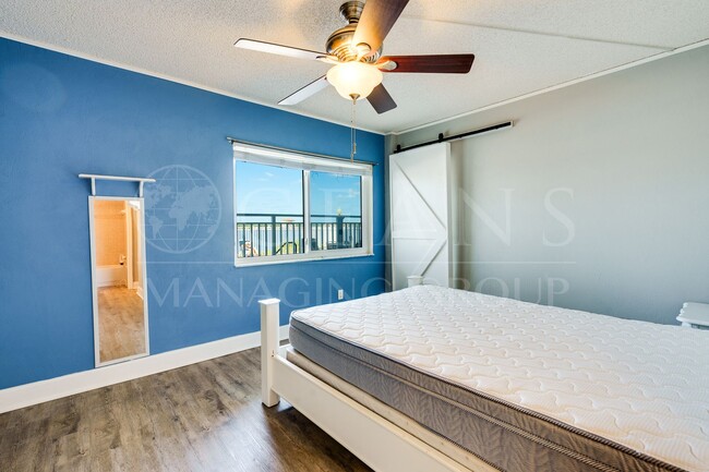 Building Photo - First Floor Riverfront Condo