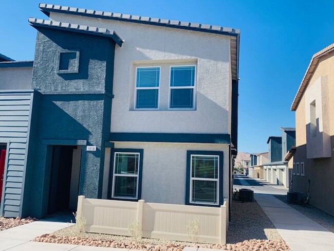 Building Photo - AMIGO TRAILS - BRAND NEW TOWNHOME