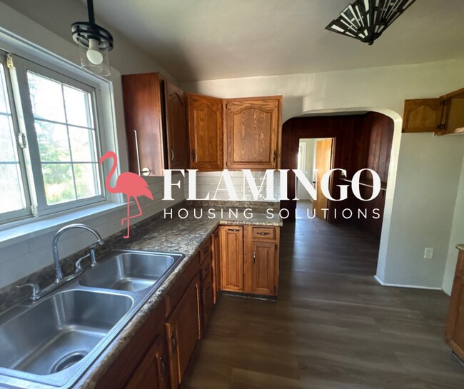 Building Photo - Charming 2 Bedroom, 1 Bath Home – Refinished Hardwood Floors, Detached Garage & More!