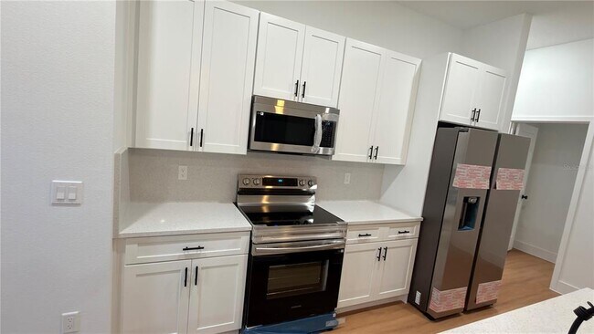 Building Photo - 7250 N Freeport Cir