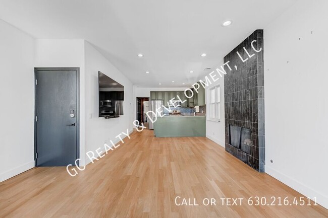 Building Photo - *** FULLY RENOVATED / FREE 87-IN TV INCLUD...