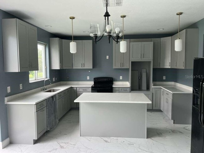 Building Photo - 545 1st Cape Coral Dr