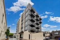 Building Photo - Top floor residence in elevator building with sweeping views.