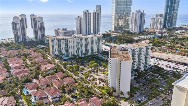 Building Photo - 19380 Collins Ave