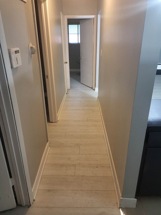 Hallway showing entrance to 3rd bedroom - 5074 Fortman Dr