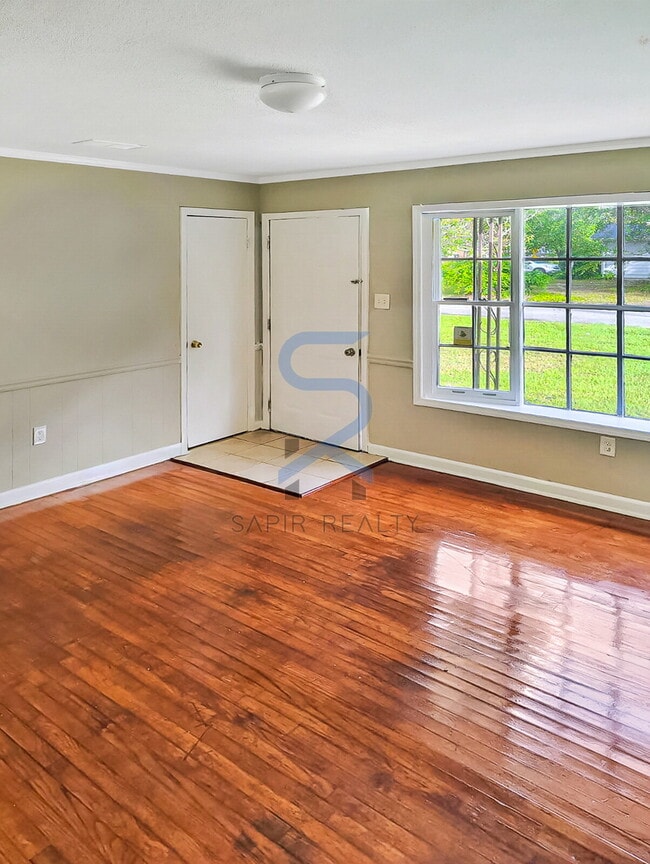 Building Photo - Move in before December 31st and choose your reward: a $250 Amazon Gift Card or a 55" Smart TV!