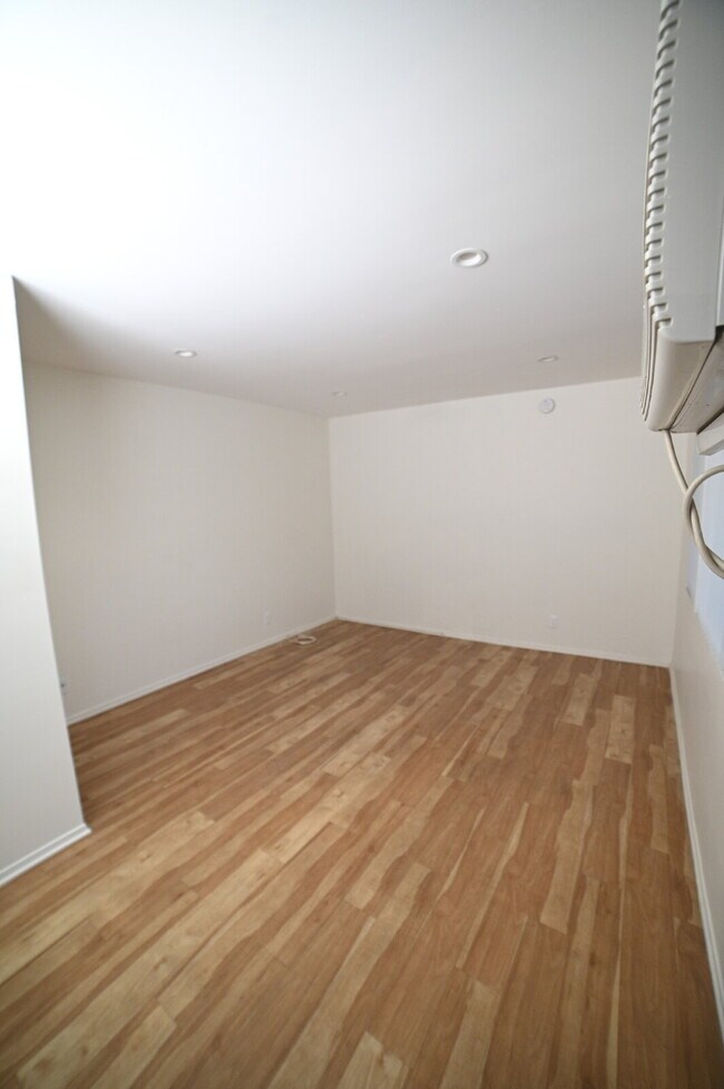 Building Photo - Newly remodeled studio in a gated building...