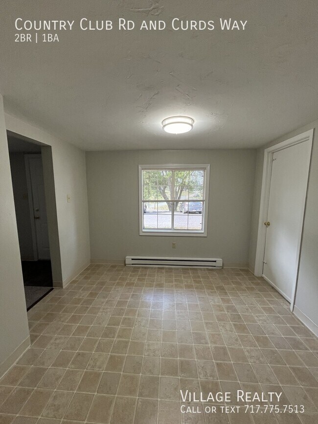 Building Photo - 671 Country Club Rd