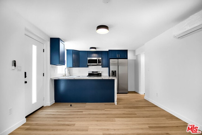 Building Photo - 1021 N Genesee Ave