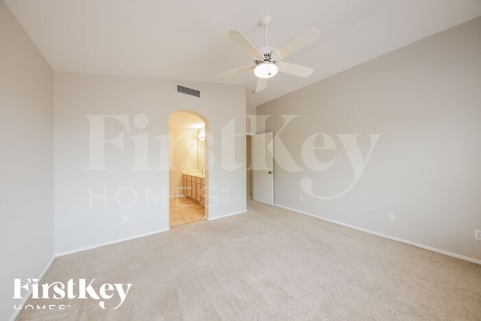 Building Photo - 6968 W Aire Libre Ave