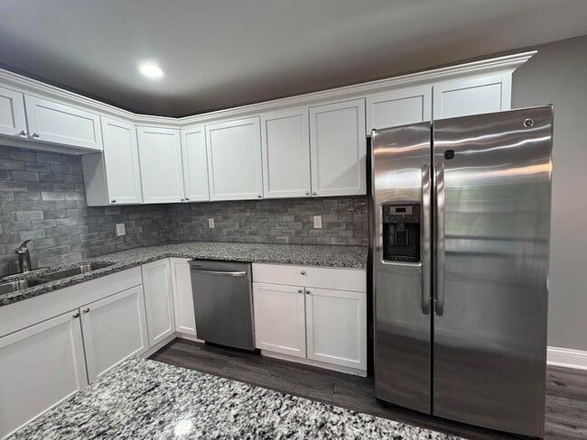 Building Photo - 541 W 67th Ln