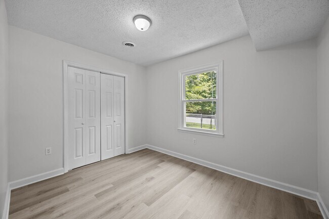 Building Photo - Fantastic Corner Lot, Updated 4 Bedroom Sp...
