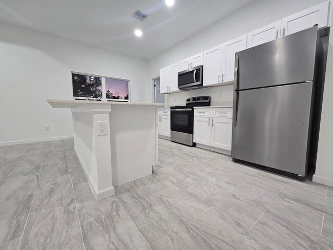 Building Photo - BRAND NEW 4/2/2-SOUTH LEHIGH ACRES