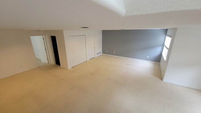 Building Photo - Beautiful Single Story Townhouse with Den & Attached 2-Car Garage