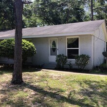Building Photo - 2BR/1BA Milton Duplex with Huge Fenced Backyard, Tile Flooring Throughout & Convenient Access to ...