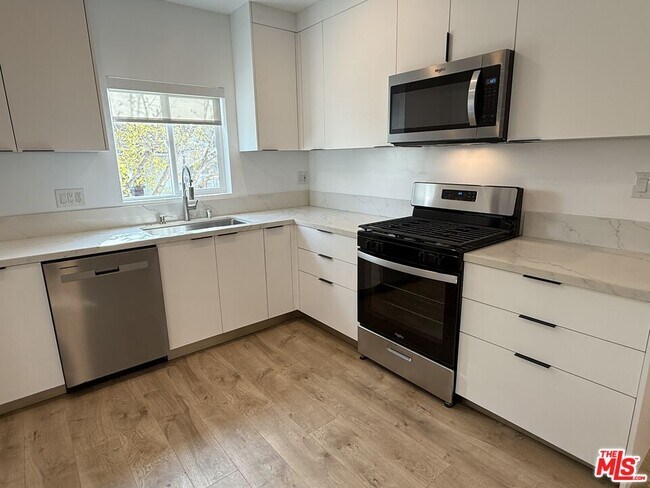 Building Photo - 7512 Norton Ave