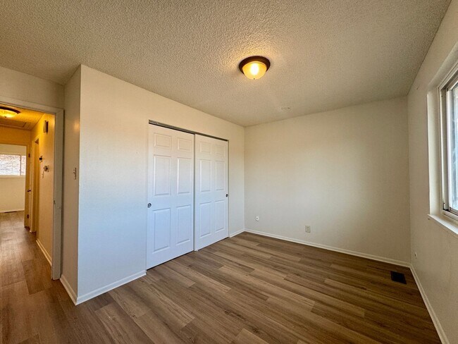 Building Photo - Spacious 5-Bedroom Single-Family Home with Fenced Yard & Garage