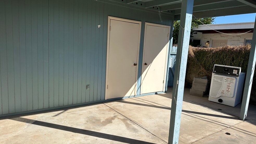 Covered patio with storage rooms - 2808 S Mill Ave