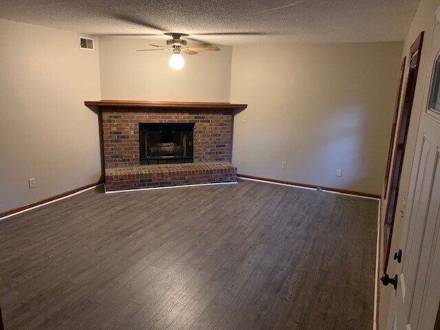 Living room fireplace - 6020 Sand Wedge Cir