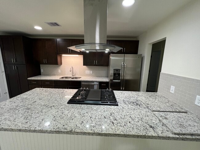 Brand new granite countertops, cabinets and appliances. - 6015 Heffernan St