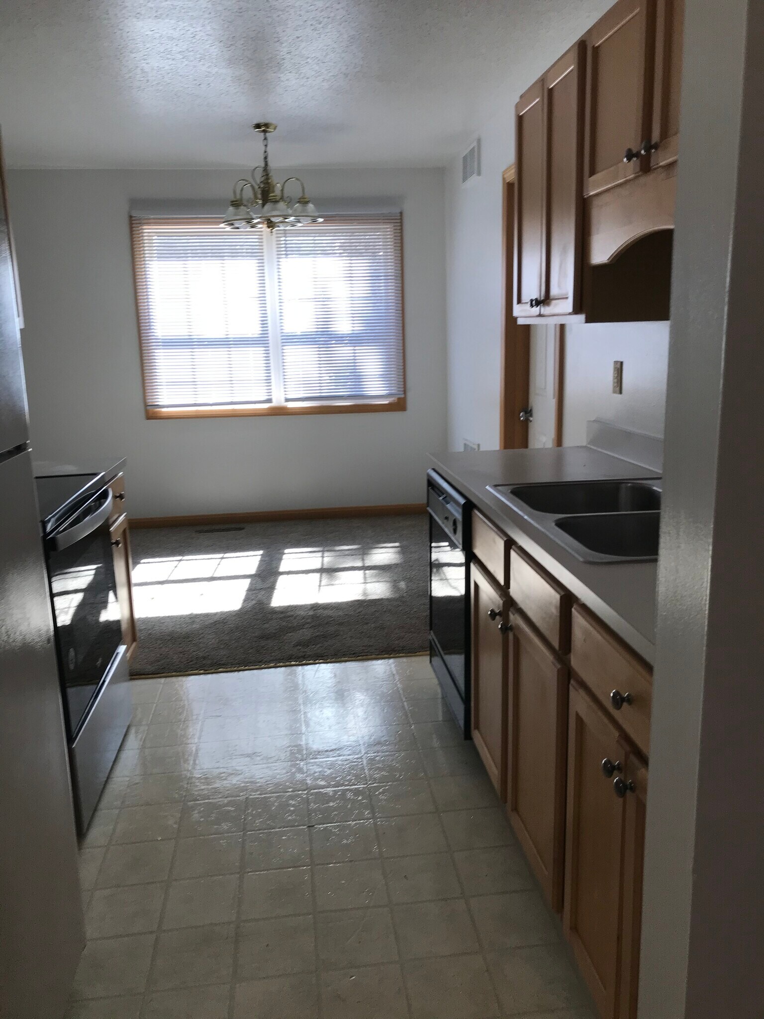 Kitchen into dining room - 5340 Cider Mill Rd