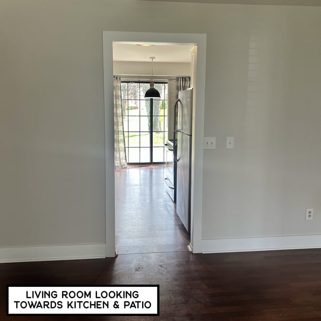 Living room looking into kitchen - 1873 Meadow Dale Ct