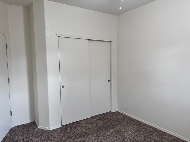 Building Photo - Wonderful 3 Br condo in gated community with the major appliances and 1 car garage.