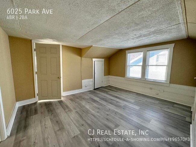 Building Photo - 6025 Park Ave