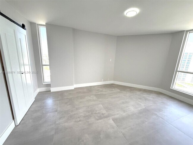 Building Photo - 6767 Collins Ave