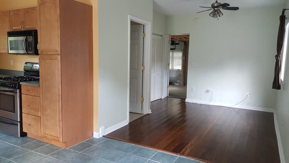 View from kitchen to living room - unfurnished - 91 Waterman Ave