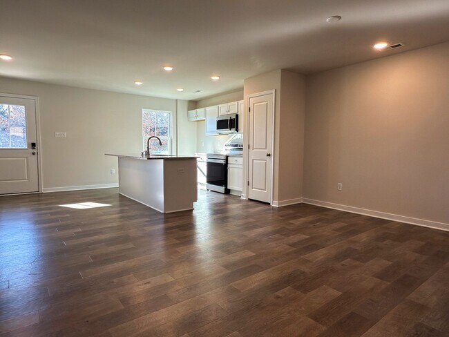 Building Photo - Modern New 3BR Townhome in Hancock Village with Luxury Finishes