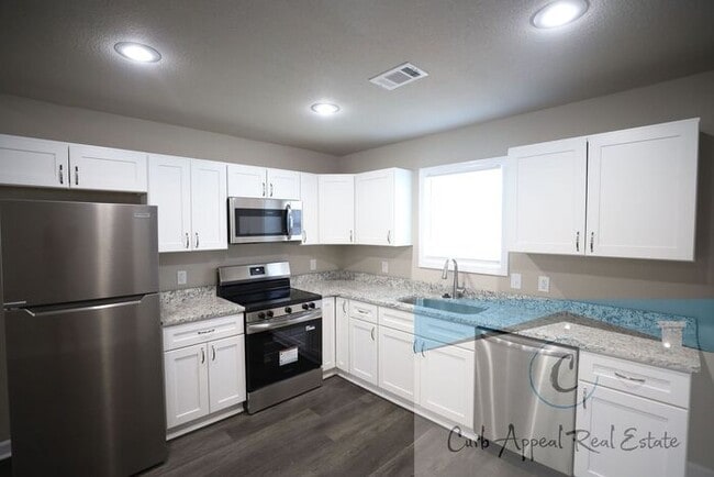 Building Photo - Brand new construction 2 bed 1 bath apartment - includes utlities, washer and dryer!!