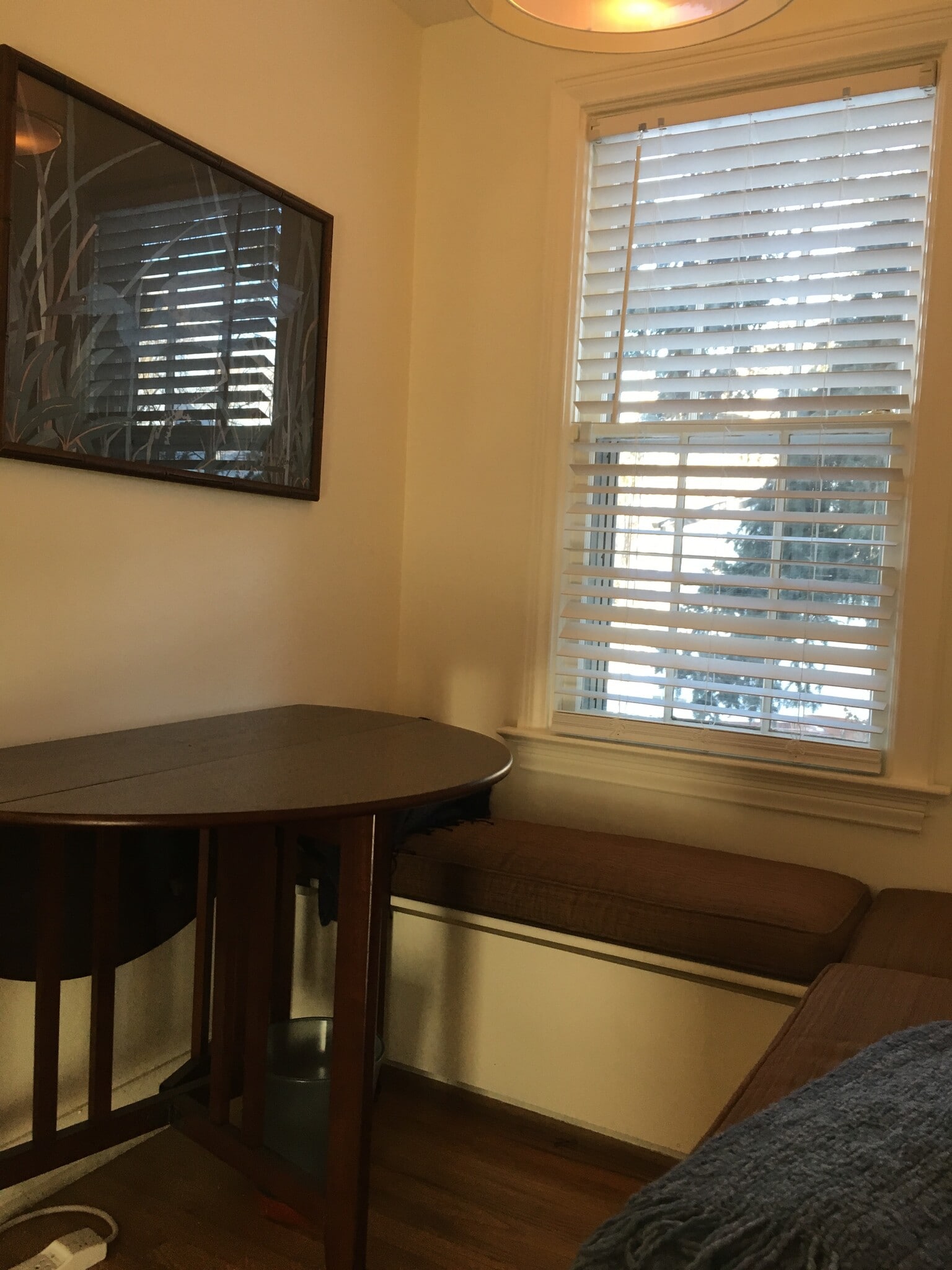 Sitting area with full foldout round table ( hinged table leaves - 555 Saulsbury St