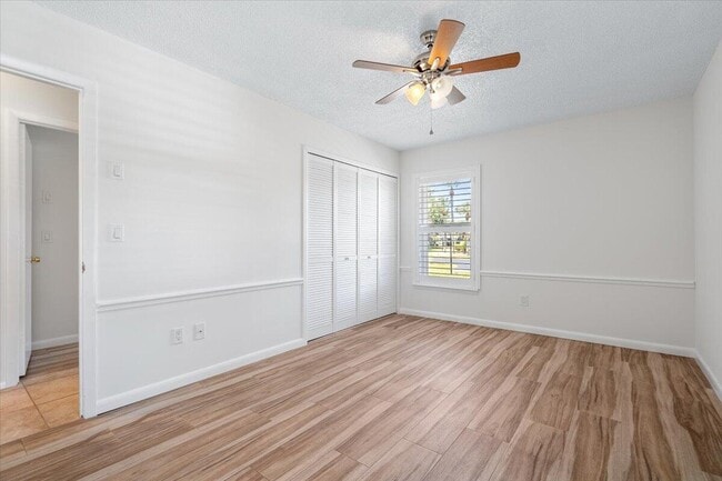 Building Photo - 3902 NW Cinnamon Tree Cir